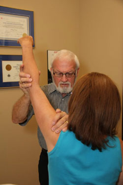 Doug working with patient